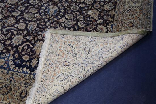 An Isfahan carpet, 8ft 4in by 4ft 8in.